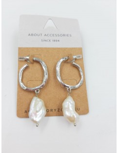 Chiseled silver hoops with...